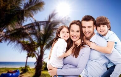 Father and mother playing with their kids