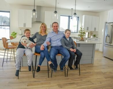FATHER AND MOTHER ENJOYING WITH KIDS ON DINING TABLE