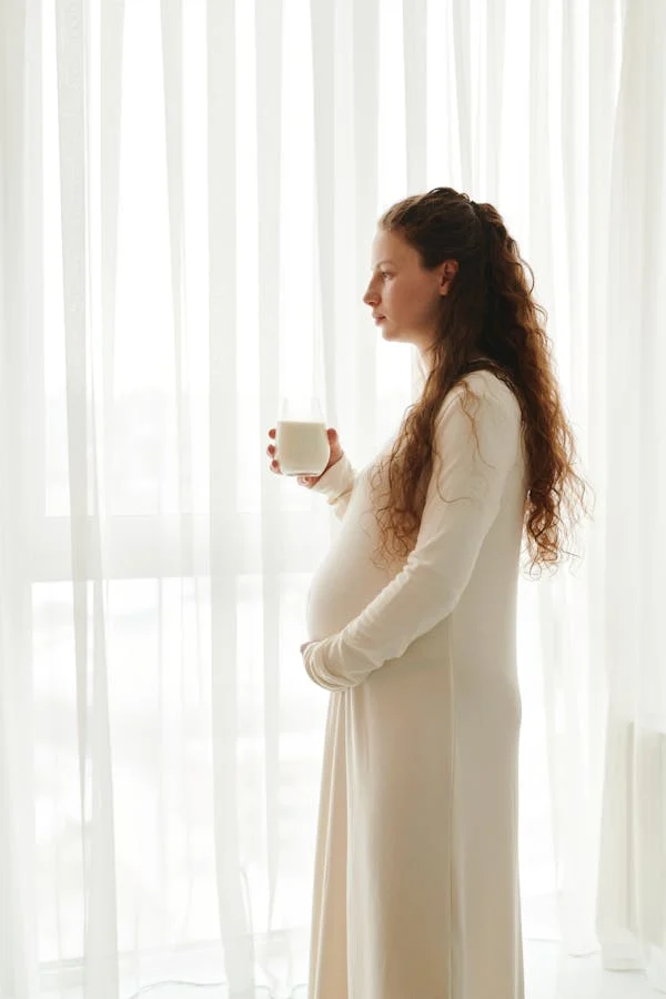 A PREGNANT WOMAN THINKING ABOUT GOING TO HOSPITA