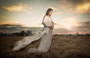 A beautufulpregnant woman in floral dress