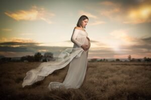 A beautufulpregnant woman in floral dress