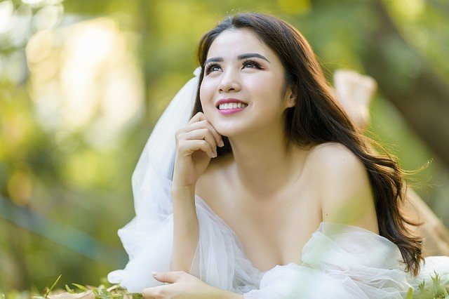 a beautiful pregnant woman wearing nice dress