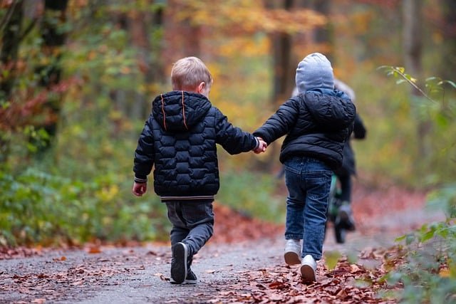 TWO CHILDREN PLAYING CONFIDENTLY