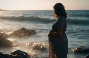 A PREGNANT WOMAN ENJOYING SEA SITE