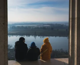 PARENTS AND CHILDREN SITTING IN THE EVENING TO HAVE A FAMILY TIME