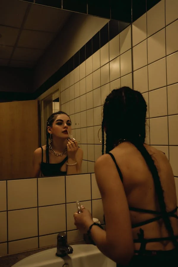 A WOMAN DOING MAKEOVER IN AN ELEGANT WASHROOM